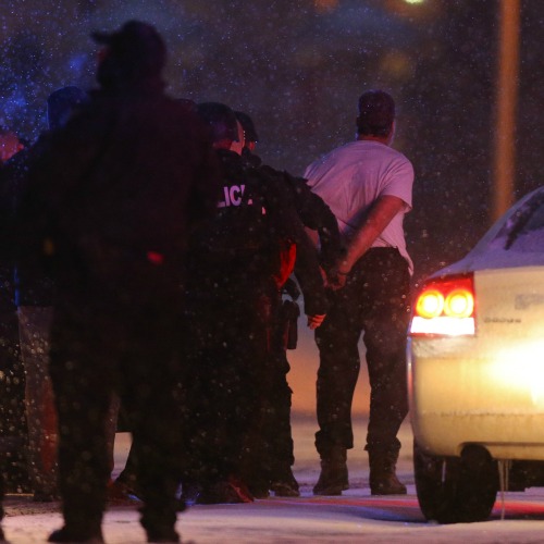 Suspect Robert Dear is led away in handcuffs by police following a deadly mass shooting Nov. 27 outside a Planned Parenthood facility in Colorado Springs, Colo. The alleged killer has no known connection with local pro-life advocates. Suspect Robert Dear is led away in handcuffs by police following a deadly mass shooting Nov. 27 outside a Planned Parenthood facility in Colorado Springs, Colo. The alleged killer has no known connection with local pro-life advocates.