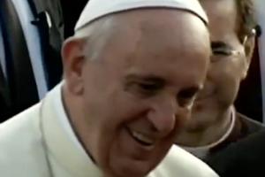 Pope Francis smiles as he greets people at his welcoming ceremony after arriving Nov. 27 in Entebbe, Uganda. Pope Francis smiles as he greets people at his welcoming ceremony after arriving Nov. 27 in Entebbe, Uganda.
