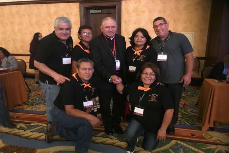 Delegates from Huntington Park, California, with Archbishop Jose Gomez of the Archdiocese of Los Angeles at the Naitonal V Encuentro. Delegates from Huntington Park, California, with Archbishop Jose Gomez of the Archdiocese of Los Angeles at the Naitonal V Encuentro.
