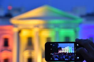 A PICTURE THAT DEFINES A DECADE. A person uses a smartphone to take a photo of the White House lit in rainbow colors, June 26, 2015, following the U.S. Supreme Court’s Obergefell decision mandating same-sex marriage nationwide. A PICTURE THAT DEFINES A DECADE. A person uses a smartphone to take a photo of the White House lit in rainbow colors, June 26, 2015, following the U.S. Supreme Court’s Obergefell decision mandating same-sex marriage nationwide.