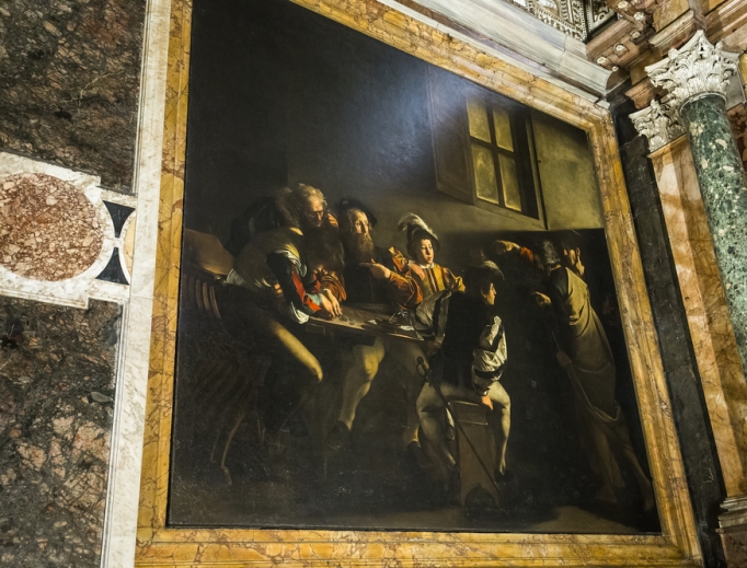 The Calling of St. Matthew hangs in the Church of San Luigi dei Francesi (St. Louis of France). The Calling of St. Matthew hangs in the Church of San Luigi dei Francesi (St. Louis of France).