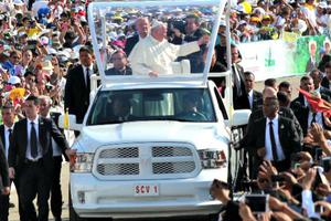 Pope Francis arrives for Mass with representatives of the indigenous communities of Chiapas, Mexico, in the municipal sport center on Feb. 15. Pope Francis arrives for Mass with representatives of the indigenous communities of Chiapas, Mexico, in the municipal sport center on Feb. 15.