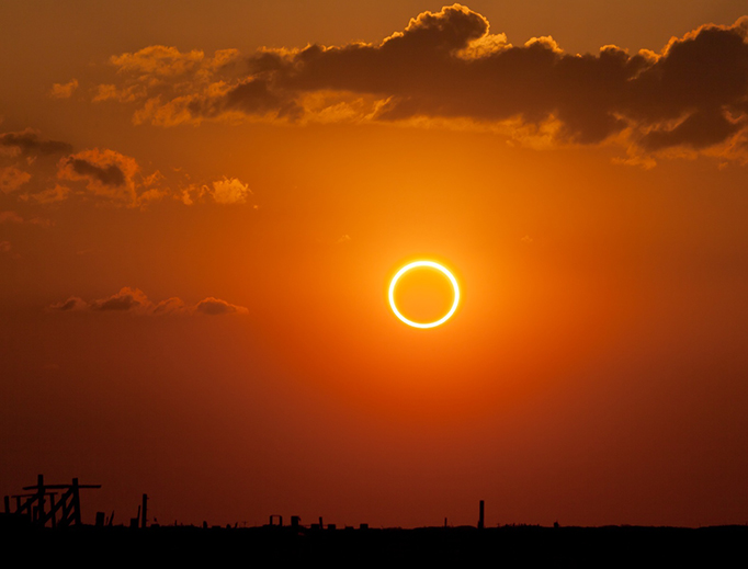 By sheer coincidence, the angular sizes of the Moon and Sun are almost exactly the same when viewed from the surface of the Earth. This results in annular eclipses, like the one seen in this photo, and even in total solar eclipses. By sheer coincidence, the angular sizes of the Moon and Sun are almost exactly the same when viewed from the surface of the Earth. This results in annular eclipses, like the one seen in this photo, and even in total solar eclipses.