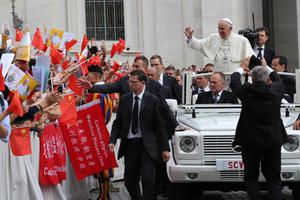 Pope Francis waves at pilgrims from China at his general audience in St. Peter's Square on Sept. 7, 2016. Pope Francis waves at pilgrims from China at his general audience in St. Peter's Square on Sept. 7, 2016.