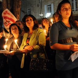 UNITED WE STAND? Palestinians attend a candlelight procession after a special memorial Mass Nov. 5 at Holy Family Church in Ramallah, West Bank, in solidarity for those killed in the Oct. 31 attack on Iraq's Syrian Catholic cathedral. Christians throughout the Middle East c alled for protection but said their faith keeps them strong. UNITED WE STAND? Palestinians attend a candlelight procession after a special memorial Mass Nov. 5 at Holy Family Church in Ramallah, West Bank, in solidarity for those killed in the Oct. 31 attack on Iraq's Syrian Catholic cathedral. Christians throughout the Middle East c alled for protection but said their faith keeps them strong.