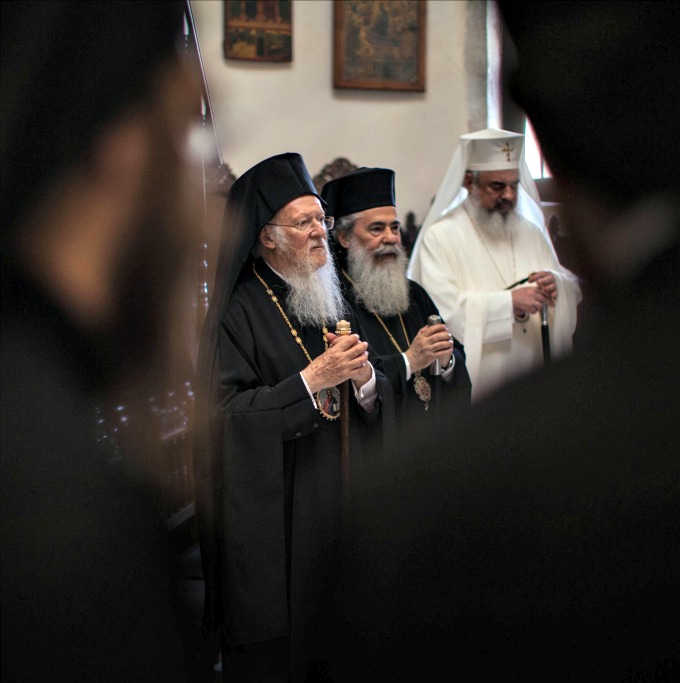 Ecumenical Patriarch Bartholomew I (l), Patriarch Theophilos of Jerusalem (c) and Patriarch Daniel of Romania take part a Divine Liturgy in Patriarchal and Stavropegial Monastery of Gonia in the Greek Island of Crete. The leaders of the world's Orthodox Christian Churches have gathered on the Greek island of Crete for a landmark meeting. Below, Father John Chryssavgis, spokesman of the Ecumenical Patriarchate, addresses questions during the Press Briefing. Ecumenical Patriarch Bartholomew I (l), Patriarch Theophilos of Jerusalem (c) and Patriarch Daniel of Romania take part a Divine Liturgy in Patriarchal and Stavropegial Monastery of Gonia in the Greek Island of Crete. The leaders of the world's Orthodox Christian Churches have gathered on the Greek island of Crete for a landmark meeting. Below, Father John Chryssavgis, spokesman of the Ecumenical Patriarchate, addresses questions during the Press Briefing.