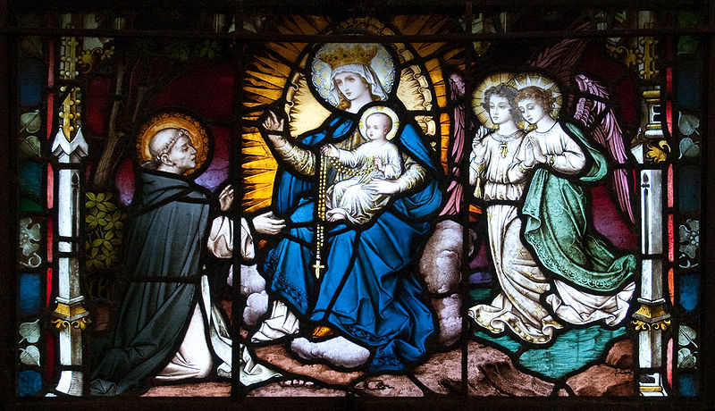 A 19th century stained glass window in Carlow Cathedral, Ireland, showing how the Rosary was given to St. Dominic in an apparition by the Blessed Virgin Mary in the year 1214. A 19th century stained glass window in Carlow Cathedral, Ireland, showing how the Rosary was given to St. Dominic in an apparition by the Blessed Virgin Mary in the year 1214.