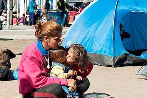 A mother and her children are among the world's millions of refugees. A mother and her children are among the world's millions of refugees.
