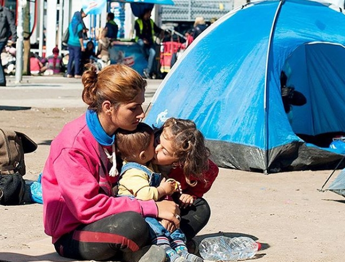 A mother and her children are among the world's millions of refugees. A mother and her children are among the world's millions of refugees.