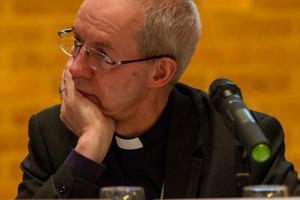 Archbishop Justin Welby of Canterbury listens during a press conference at the Jan. 11-15 Anglican primates’ conference in Canterbury, England. Archbishop Justin Welby of Canterbury listens during a press conference at the Jan. 11-15 Anglican primates’ conference in Canterbury, England.