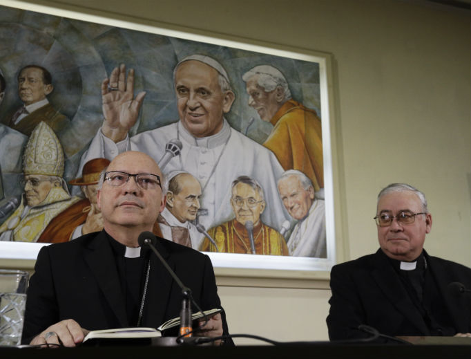 Auxiliary Bishop Luis Fernando Ramos Perez of Santiago de Chile (l) and Bishop Juan Ignacio Gonzalez of San Bernardo meet reporters at the Vatican May 14. Auxiliary Bishop Luis Fernando Ramos Perez of Santiago de Chile (l) and Bishop Juan Ignacio Gonzalez of San Bernardo meet reporters at the Vatican May 14.