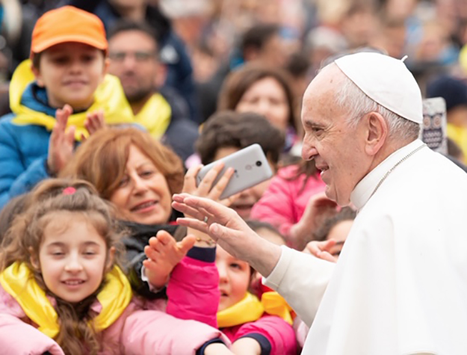 Pope Francis greets pilgrims during his General Audience in St. Peter's Square. Pope Francis greets pilgrims during his General Audience in St. Peter's Square.