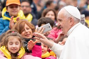 Pope Francis greets pilgrims during his General Audience in St. Peter's Square. Pope Francis greets pilgrims during his General Audience in St. Peter's Square.
