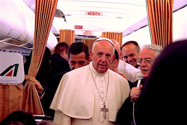 Pope Francis about to answer questions on the papal plane from Armenia, June 26, 2016. Pope Francis about to answer questions on the papal plane from Armenia, June 26, 2016.