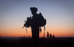Lance Cpl. James Harris, with the 2nd Battalion 2nd Marines from Camp Lejeune, N.C., is silhouetted at dawn during an operation in the Garmsir district of Helmand Province, Afghanistan, Dec. 23. Lance Cpl. James Harris, with the 2nd Battalion 2nd Marines from Camp Lejeune, N.C., is silhouetted at dawn during an operation in the Garmsir district of Helmand Province, Afghanistan, Dec. 23.