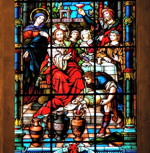 Detail of a stained-glass window from Malaga, Spain, depicting the wedding at Cana. Detail of a stained-glass window from Malaga, Spain, depicting the wedding at Cana.