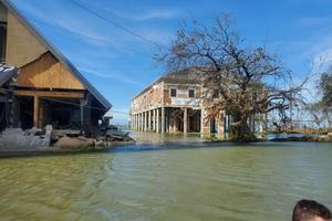 A residential neighborhood in Lake Charles flooded from Hurricane Laura, a Category 4 hurricane that left many homes damaged. A residential neighborhood in Lake Charles flooded from Hurricane Laura, a Category 4 hurricane that left many homes damaged.