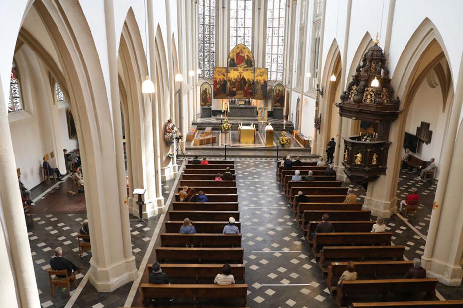 BONN, GERMANY - MAY 03: People arrive for mass at St. Remigius Catholic church for Sunday mass for the first time since March during the novel coronavirus crisis on May 3, 2020 in Bonn, Germany. (Photo by Andreas Rentz/Getty Images) BONN, GERMANY - MAY 03: People arrive for mass at St. Remigius Catholic church for Sunday mass for the first time since March during the novel coronavirus crisis on May 3, 2020 in Bonn, Germany. (Photo by Andreas Rentz/Getty Images)