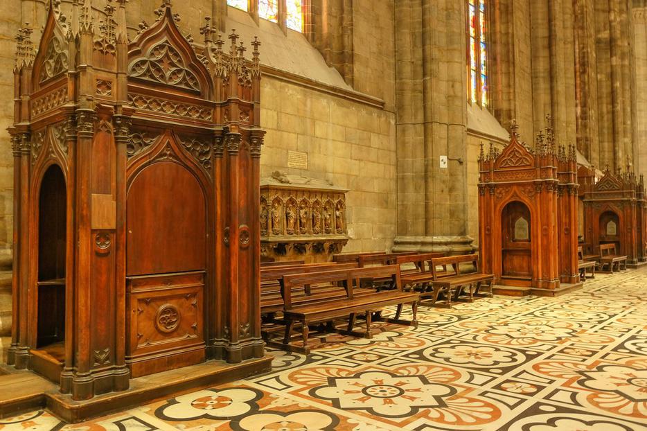Confessionals inside the Duomo in Milan, Italy. Confessionals inside the Duomo in Milan, Italy.