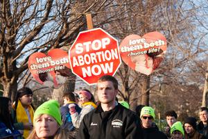 Marchers carry signs at the March for Life 2020. Marchers carry signs at the March for Life 2020.