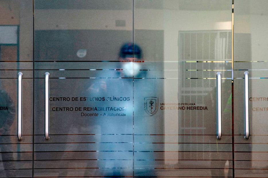 A health worker remains inside the clinical studies center of the Cayetano Heredia University in Lima on September 09, 2020, where a Chinese potential vaccine against COVID-19 will be tested on volunteers. The clinical testing phase of a Chinese potential vaccine against COVID-19 started Wednesday in Peru, where 6,000 volunteers will get it. A health worker remains inside the clinical studies center of the Cayetano Heredia University in Lima on September 09, 2020, where a Chinese potential vaccine against COVID-19 will be tested on volunteers. The clinical testing phase of a Chinese potential vaccine against COVID-19 started Wednesday in Peru, where 6,000 volunteers will get it.