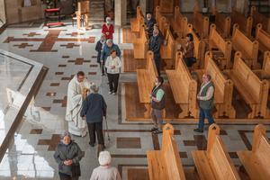Parishioners social-distance while taking Communion amid the coronavirus pandemic in Lubin, Poland on May 21, 2020. Parishioners social-distance while taking Communion amid the coronavirus pandemic in Lubin, Poland on May 21, 2020.