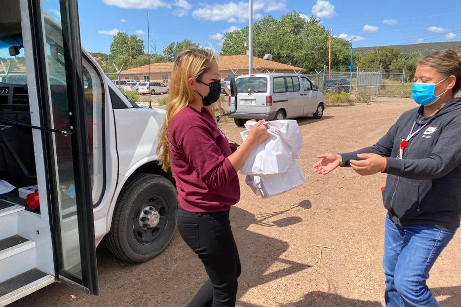 St. Michael’s Indian School employees have worked to provide food support to Native families traveling to distribution centers. St. Michael’s Indian School employees have worked to provide food support to Native families traveling to distribution centers.