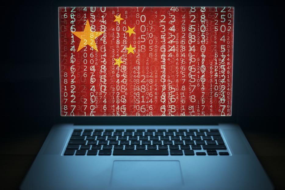 Laptop with binary computer code and china flag on the screen. Laptop with binary computer code and china flag on the screen.