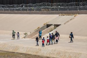 Migrants from Central America cross the US-Mexico border to seek asylum in the United States. Migrants from Central America cross the US-Mexico border to seek asylum in the United States.