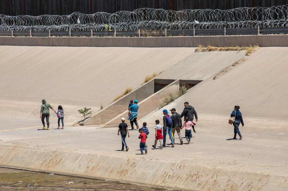 Migrants from Central America cross the US-Mexico border to seek asylum in the United States. Migrants from Central America cross the US-Mexico border to seek asylum in the United States.