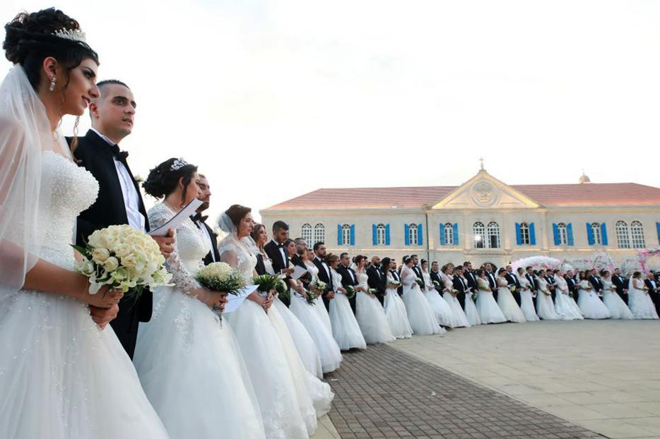 Forty-one Lebanese Catholic couples take part in a mass wedding at the Maronite Patriarchate in Bkerké on Sept. 2, 2018. Forty-one Lebanese Catholic couples take part in a mass wedding at the Maronite Patriarchate in Bkerké on Sept. 2, 2018.
