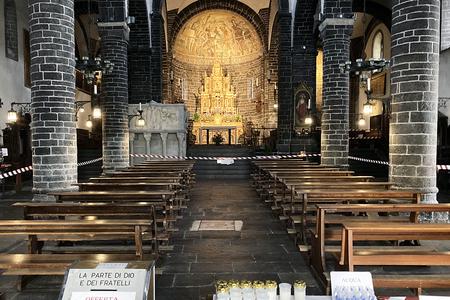 In this parish church in Bellagio, Italy, on July 22, pews are sealed off to prevent kneeling, even between Masses. In this parish church in Bellagio, Italy, on July 22, pews are sealed off to prevent kneeling, even between Masses.