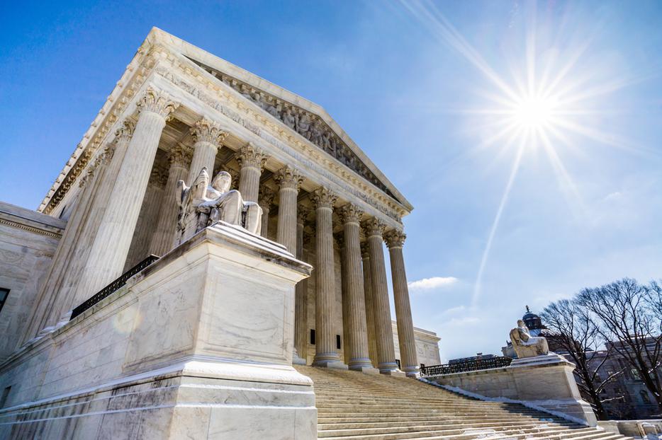The Supreme Court of the United States in Washington, D.C. on a crisp Spring day. The Supreme Court of the United States in Washington, D.C. on a crisp Spring day.
