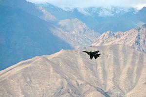 An Indian fighter jet flies over Leh, the joint capital of the union territory of Ladakh, on June 25. Indian fighter jets roared over a flashpoint Himalayan region on June 24 as part of a show of strength following a Chinese takeover of contested territory at the mouth of the Galwan valley, Indian military sources told AFP. An Indian fighter jet flies over Leh, the joint capital of the union territory of Ladakh, on June 25. Indian fighter jets roared over a flashpoint Himalayan region on June 24 as part of a show of strength following a Chinese takeover of contested territory at the mouth of the Galwan valley, Indian military sources told AFP.