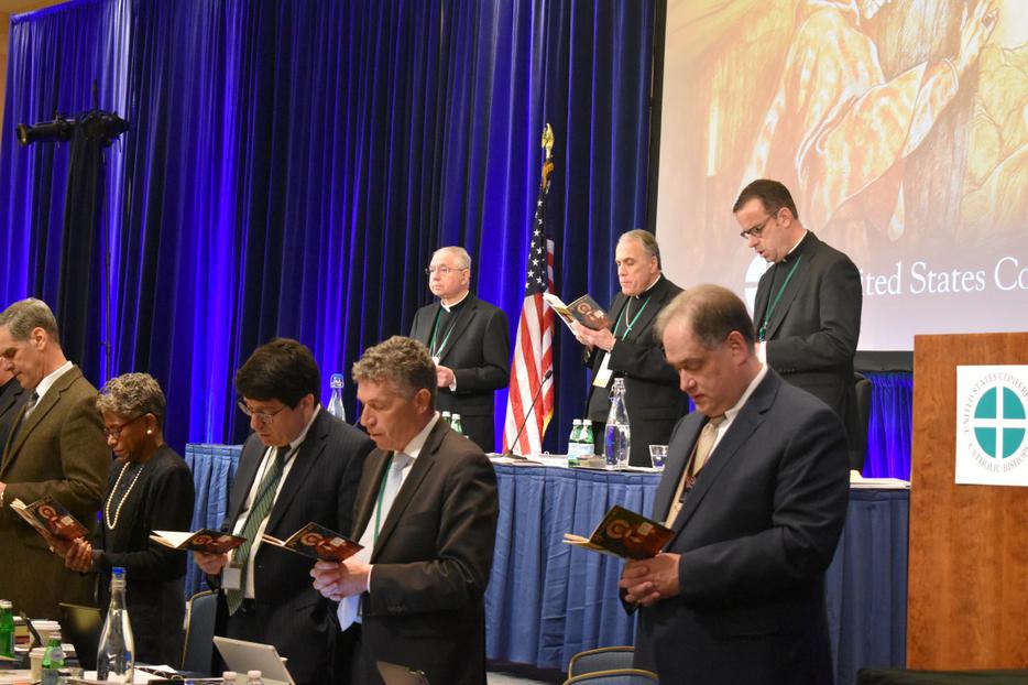 Members of the United States Conference of Catholic Bishops pray together at the beginning of the morning session on the first day of their Fall Meeting in Baltimore, Maryland on Nov. 11, 2019 Members of the United States Conference of Catholic Bishops pray together at the beginning of the morning session on the first day of their Fall Meeting in Baltimore, Maryland on Nov. 11, 2019