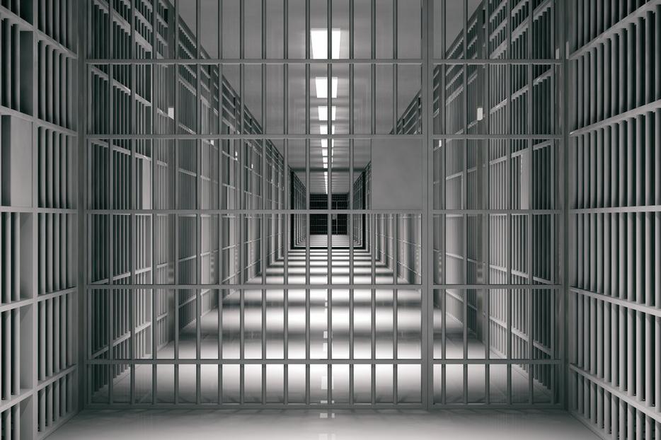 Interior shot of a prison cell block. Interior shot of a prison cell block.