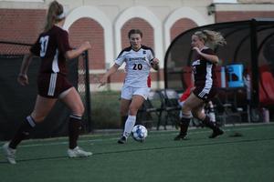 Emma Strecker, c, the captain of women’s soccer at Benedictine College, has her eye on the ball. Emma Strecker, c, the captain of women’s soccer at Benedictine College, has her eye on the ball.