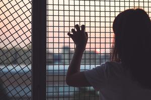 A child trapped in the world of human trafficking. A child trapped in the world of human trafficking.