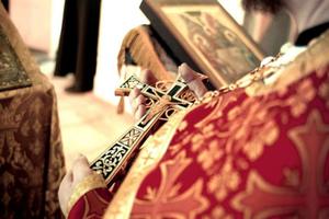 Byzantine priest holds a crucifix. Byzantine priest holds a crucifix.
