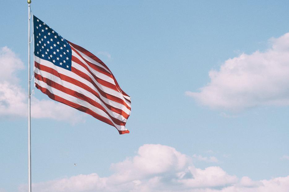 U.S. flag waves in the wind. Election Day 2020 draws near. U.S. flag waves in the wind. Election Day 2020 draws near.