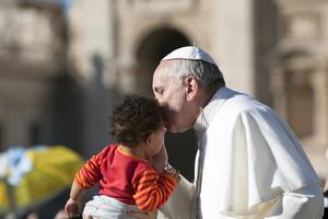 Pope Francis on the popemobile kiss child in St. Peter's Square on november 6 2013. Pope Francis on the popemobile kiss child in St. Peter's Square on november 6 2013.