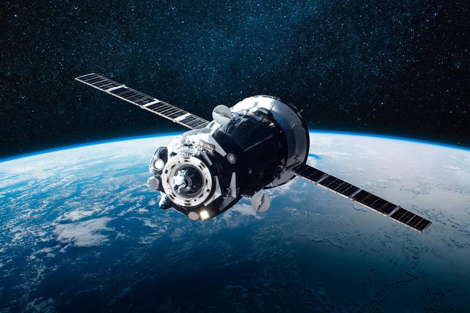 Cargo space craft roaming over planet Earth. Cargo space craft roaming over planet Earth.
