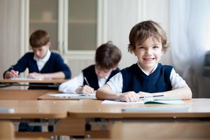 Students sit in class at a Catholic school. Students sit in class at a Catholic school.