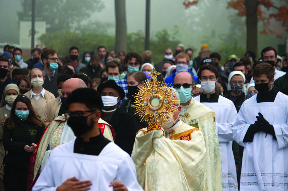 Bishop Jeffrey Montforton of Steubenville, Ohio, carrying a monstrance containing the Blessed
Sacrament, leads a procession from the Franciscan University campus through downtown Steubenville Oct. 3 as part of the nationwide ‘Unite the Nation’ events. Bishop Jeffrey Montforton of Steubenville, Ohio, carrying a monstrance containing the Blessed
Sacrament, leads a procession from the Franciscan University campus through downtown Steubenville Oct. 3 as part of the nationwide ‘Unite the Nation’ events.
