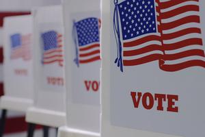 Row of voting booths at polling station during the 2020 American election. Row of voting booths at polling station during the 2020 American election.