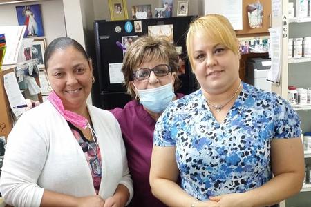 Co-owner Carmen Cartaya (center, wearing mask) works alongside two employees of David’s Pharmacy in Tampa, Florida. The pharmacy does not dispense contraceptives. Co-owner Carmen Cartaya (center, wearing mask) works alongside two employees of David’s Pharmacy in Tampa, Florida. The pharmacy does not dispense contraceptives.