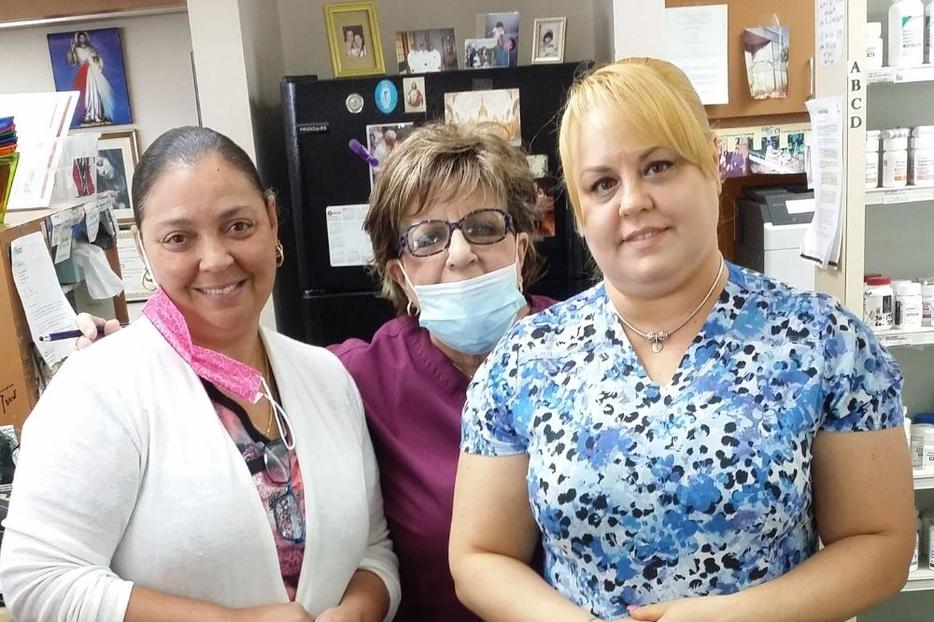 Co-owner Carmen Cartaya (center, wearing mask) works alongside two employees of David’s Pharmacy in Tampa, Florida. The pharmacy does not dispense contraceptives. Co-owner Carmen Cartaya (center, wearing mask) works alongside two employees of David’s Pharmacy in Tampa, Florida. The pharmacy does not dispense contraceptives.