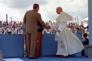 President Ronald Reagan greets Pope St. John Paul II at Miami International Airport Sept. 10, 1987. President Ronald Reagan greets Pope St. John Paul II at Miami International Airport Sept. 10, 1987.