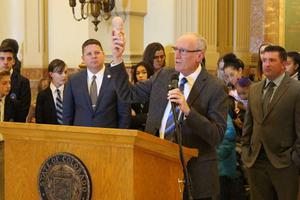 Dr. Tom Perille, president of Colorado's chapter of Democrats for Life, displays a model of a seven-month-old fetus at the Colorado capitol, Feb. 11, 2020. Dr. Tom Perille, president of Colorado's chapter of Democrats for Life, displays a model of a seven-month-old fetus at the Colorado capitol, Feb. 11, 2020.