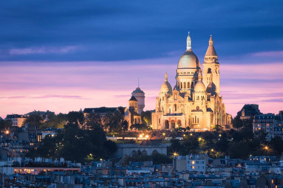 The Basilica of the Sacred Heart (Sacre Cœur Basilica) in Montmartre, Paris, France. The Basilica of the Sacred Heart (Sacre Cœur Basilica) in Montmartre, Paris, France.